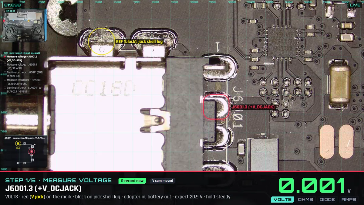 The bench page during a repair, step 1 of 5. Live microscope view with the probe mark on J6001.3, the black reference ring on the jack shell lug, the quest list and the meter reading 0.001 V.