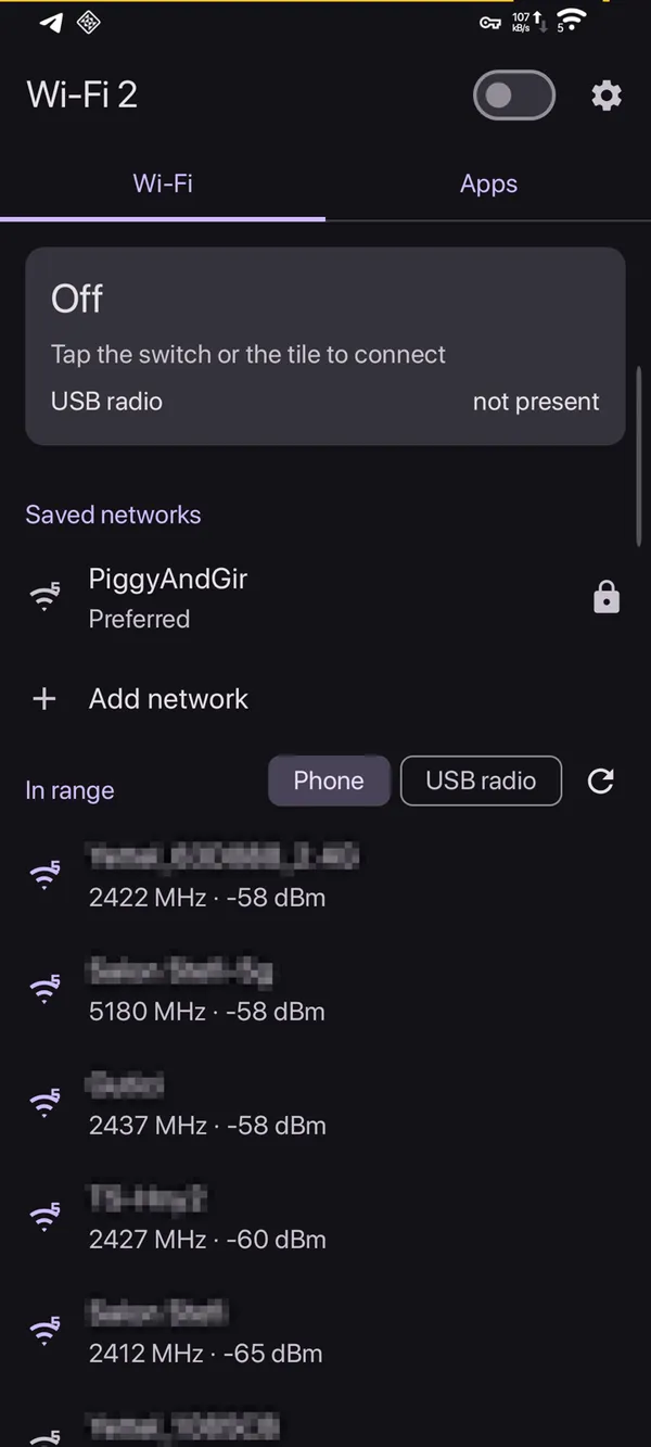 Wi-Fi tab. The link card on top, saved networks, then what is in range. Neighbour network names are blurred.